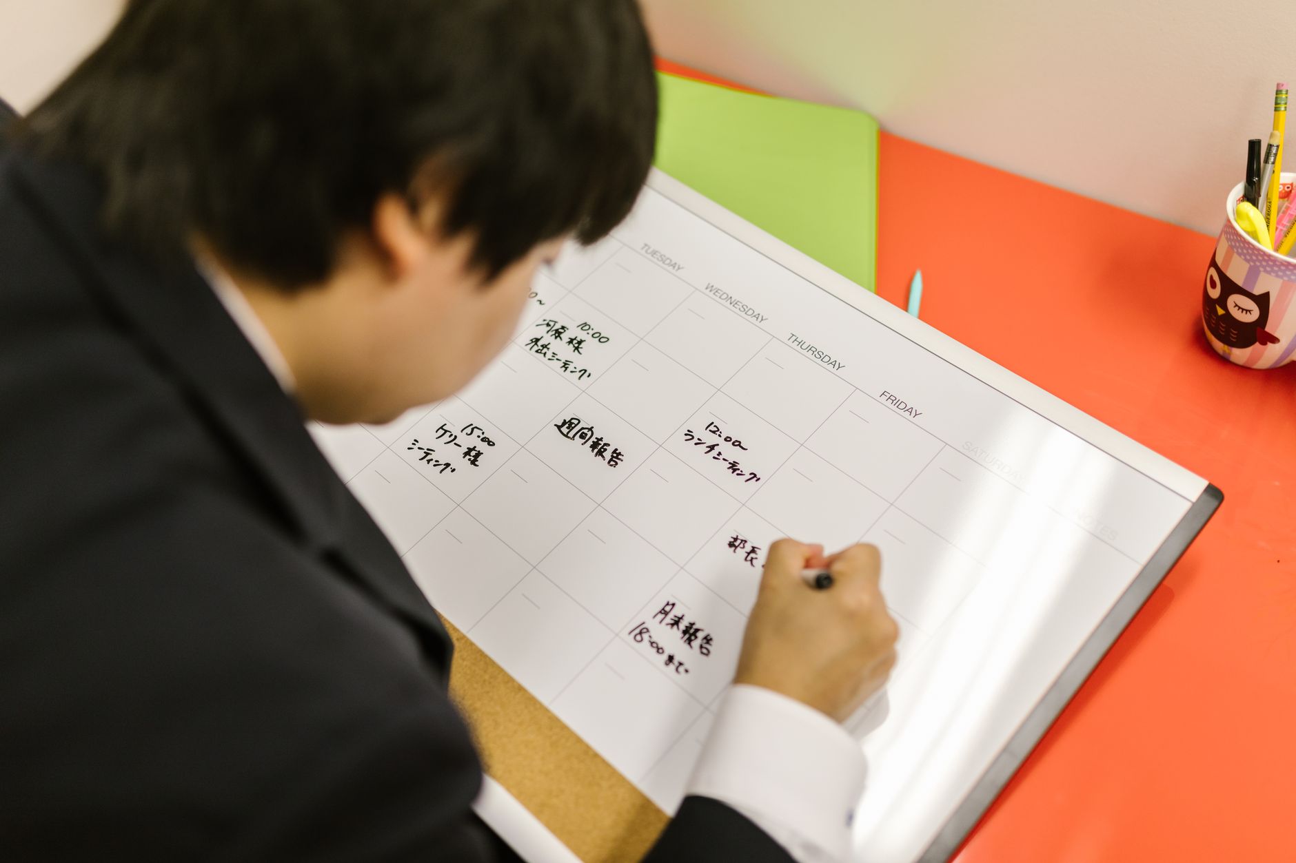 Calendar with time blocks reserved for critical tasks of a freelance developer
