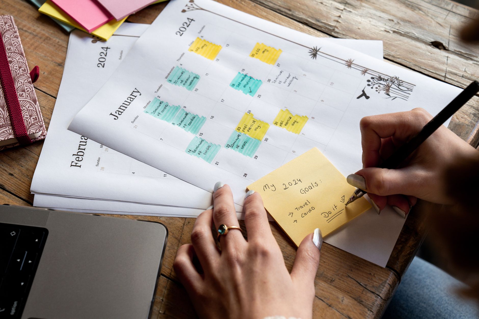 Calendar view in Foco showing tasks from different clients in distinct colors