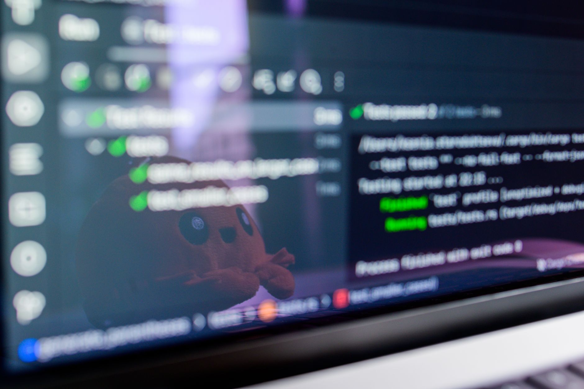 Developer comparing tools like GitHub and Jira on a laptop