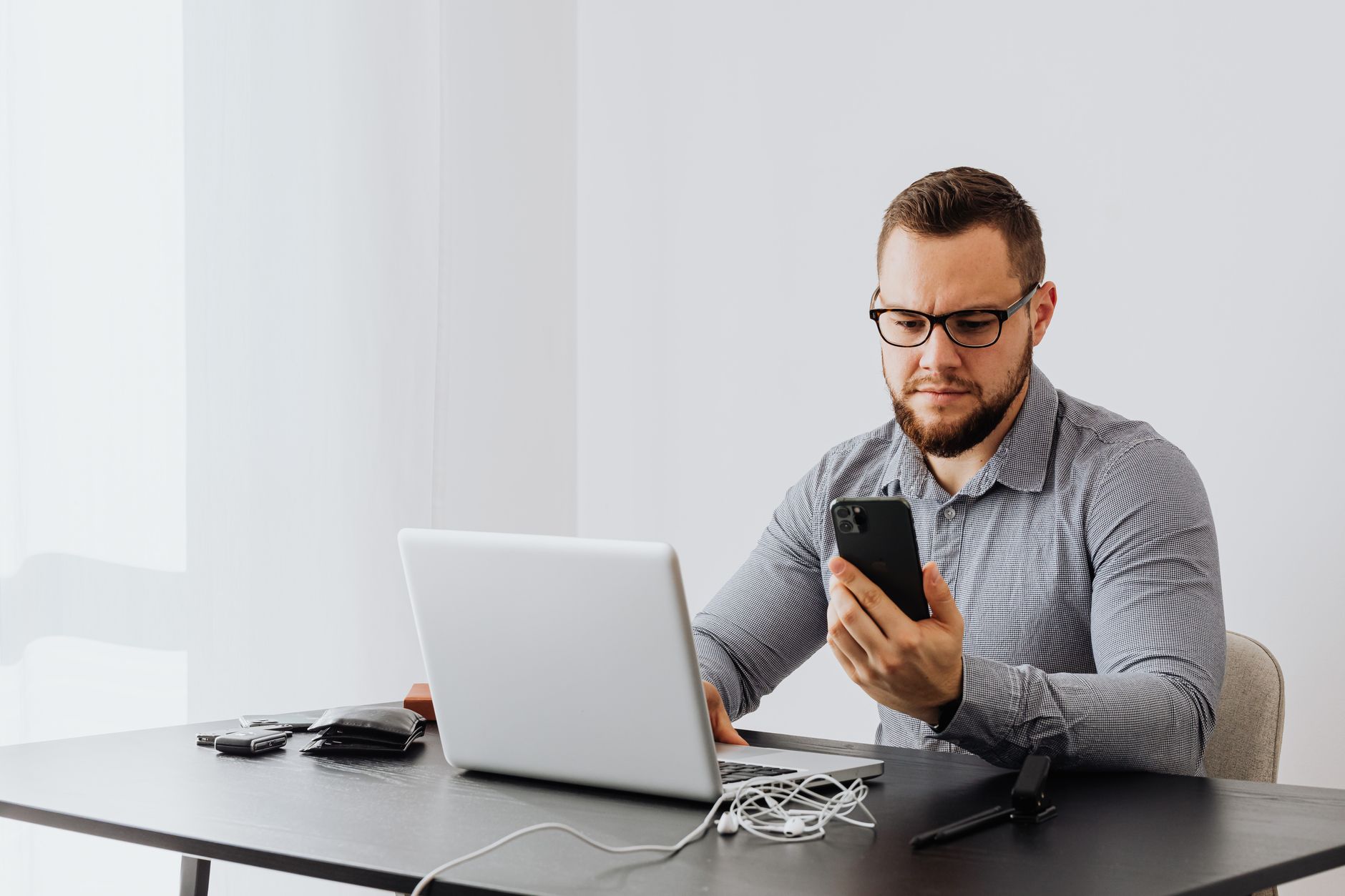 Developer checking GitHub issues on a phone with tasks synced in Foco.