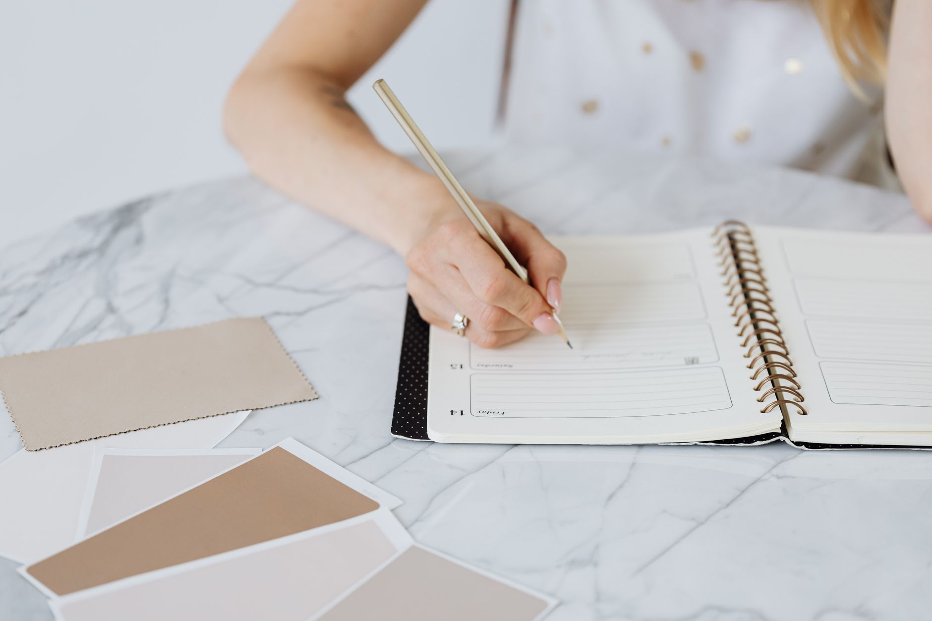 Freelance designer planning tasks in Foco's calendar with deadlines from multiple clients.