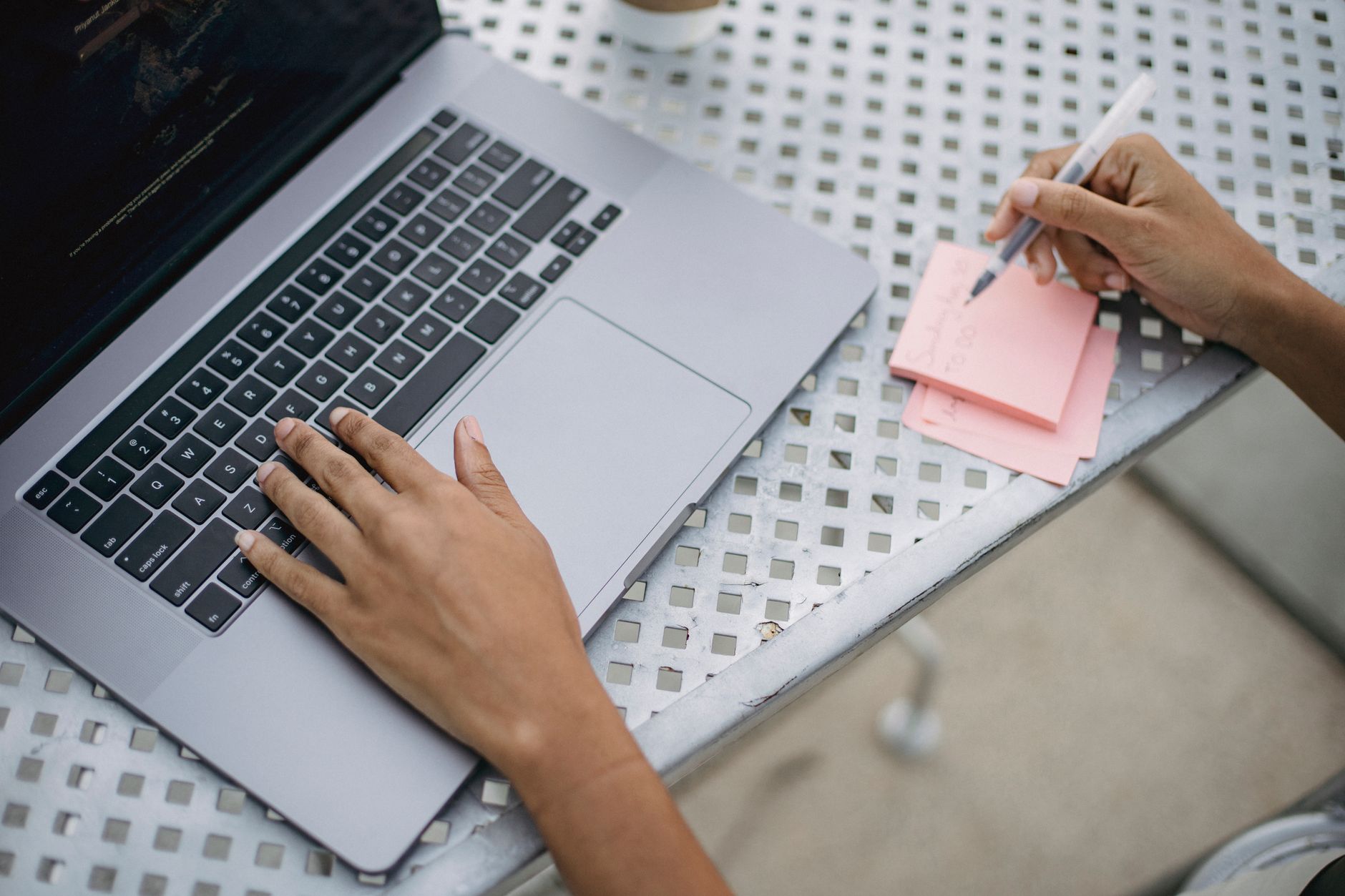 Freelancer managing tasks from multiple clients on a laptop with Foco
