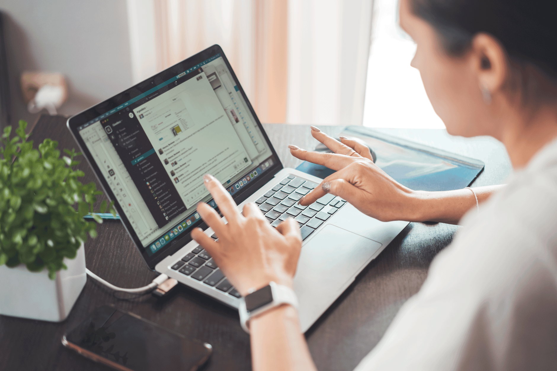 Freelancer reviewing tasks from multiple clients on a laptop with Foco