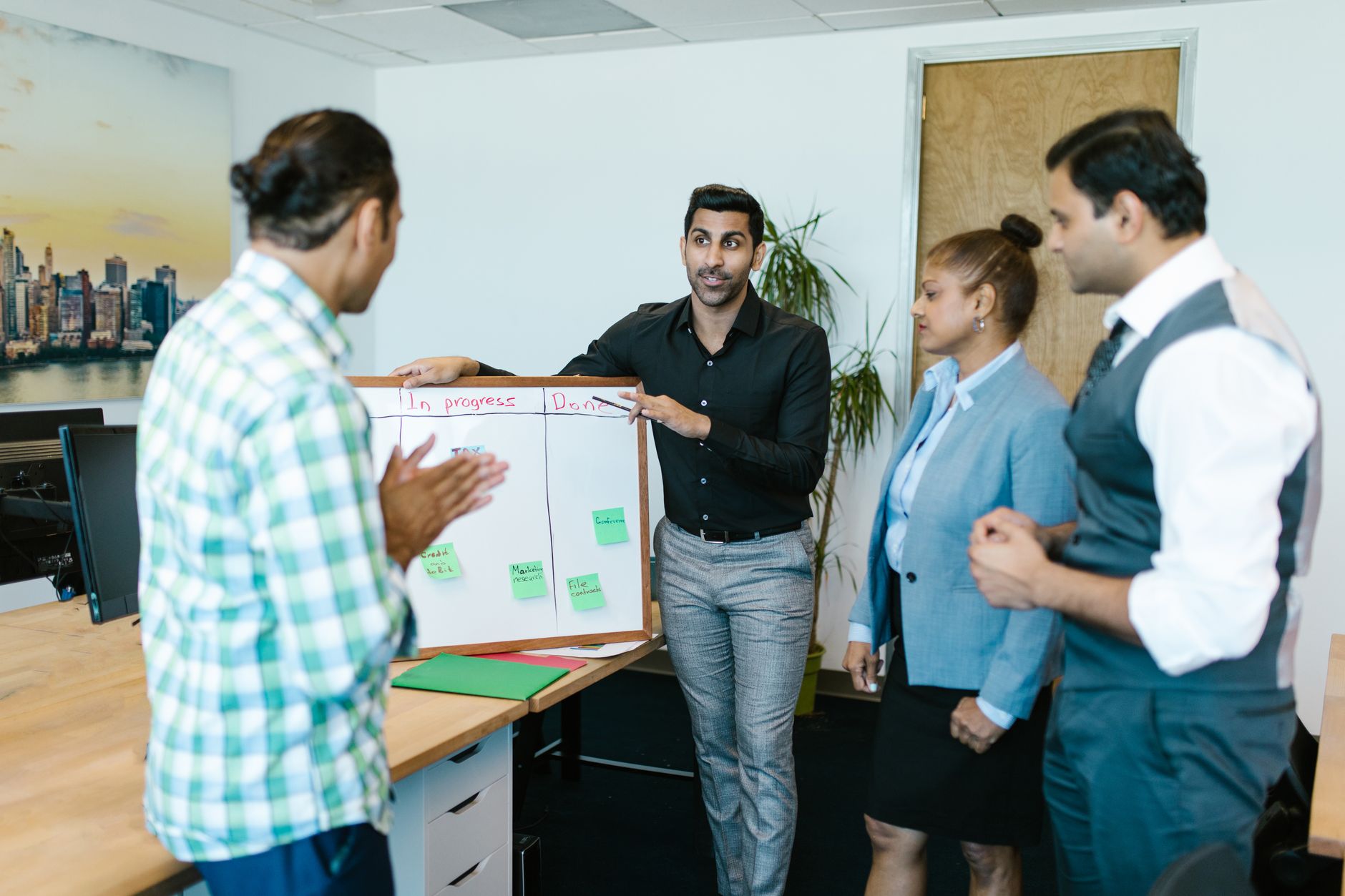 Kanban board with tasks from multiple projects organized by colors