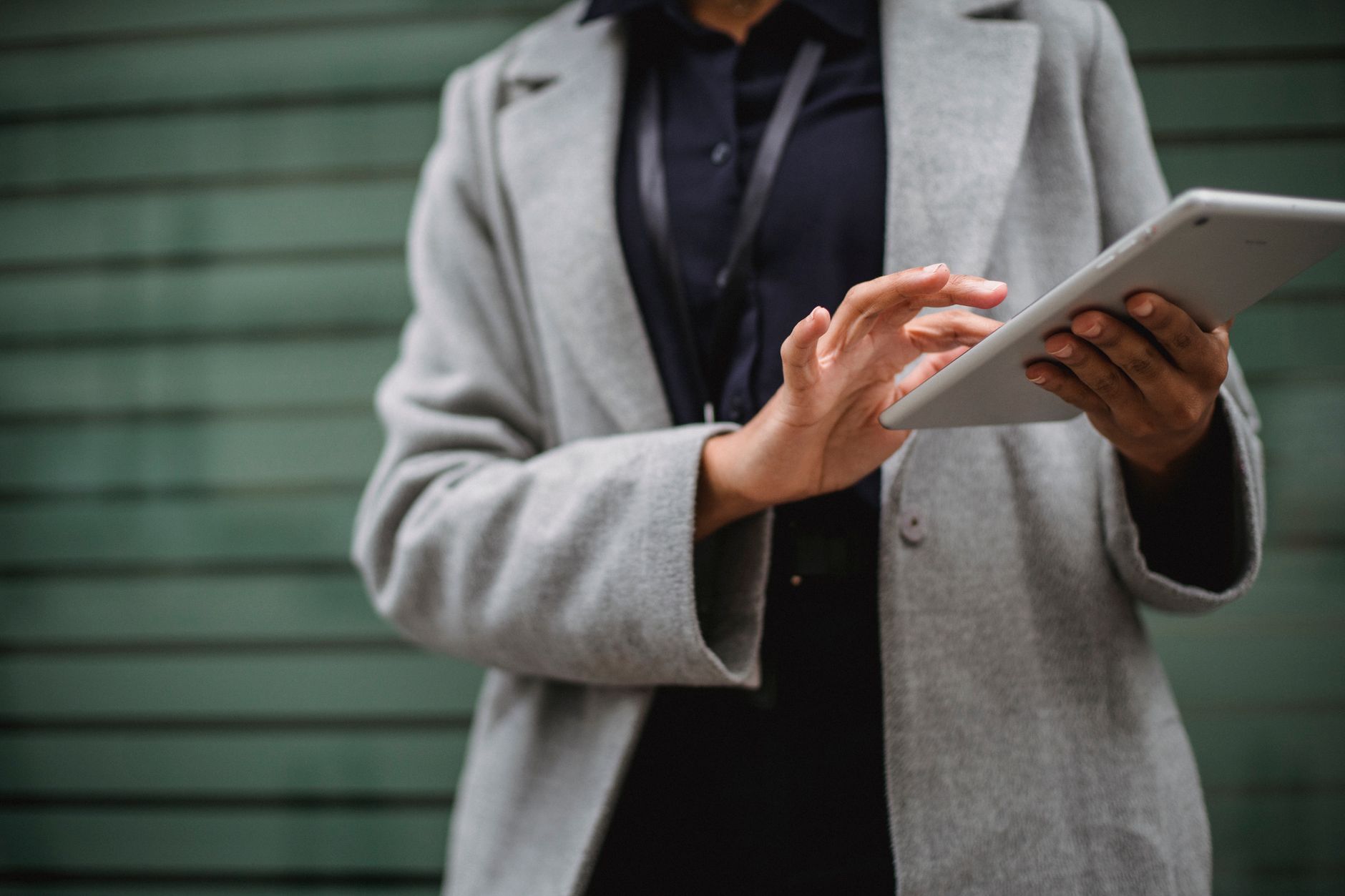 Freelancer managing tasks from multiple clients on a tablet