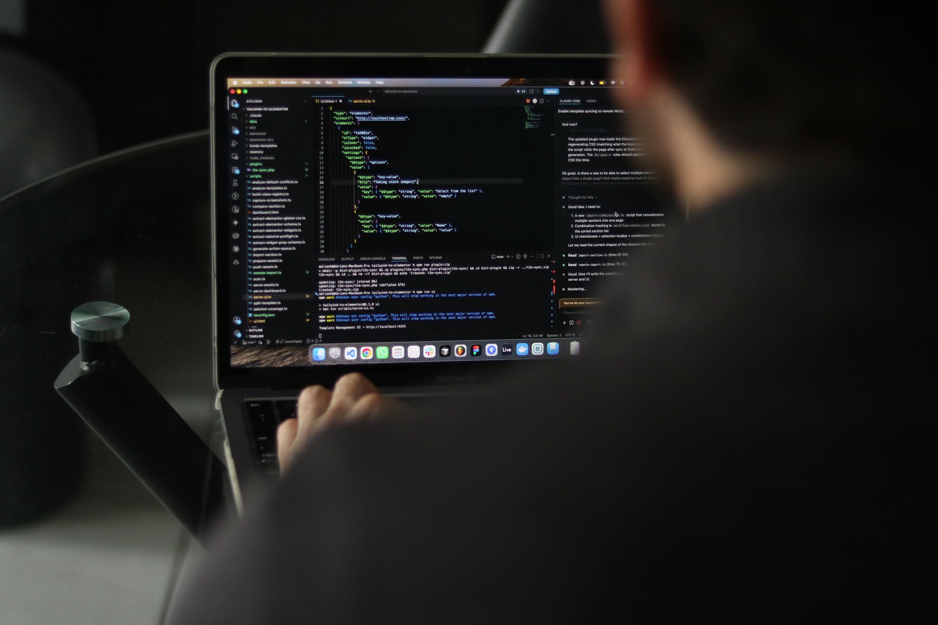 Developer reviewing GitHub issues on a laptop with Foco