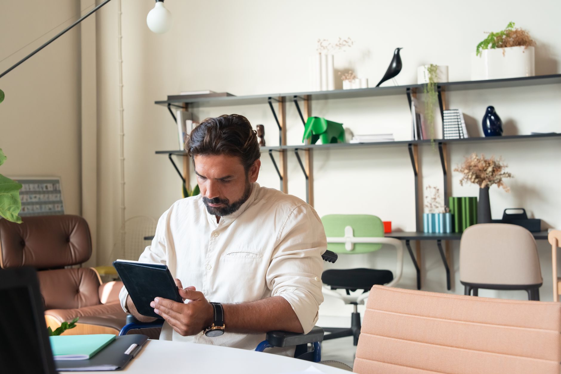 Freelancer organizing tasks for multiple clients on a tablet