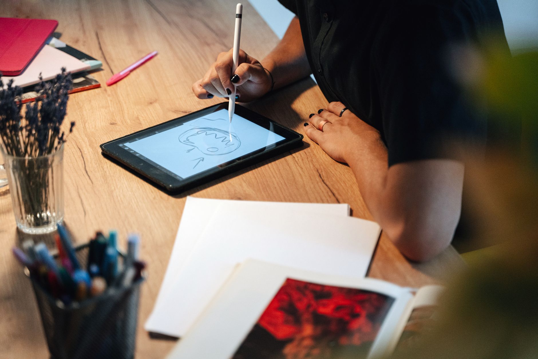Freelancer organizing tasks from multiple clients on a tablet with Foco app.