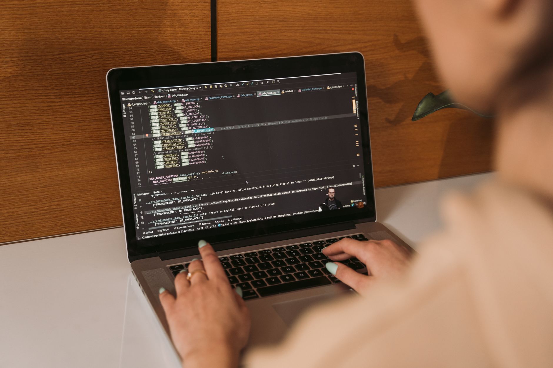 Developer reviewing GitHub issues in Foco on a laptop