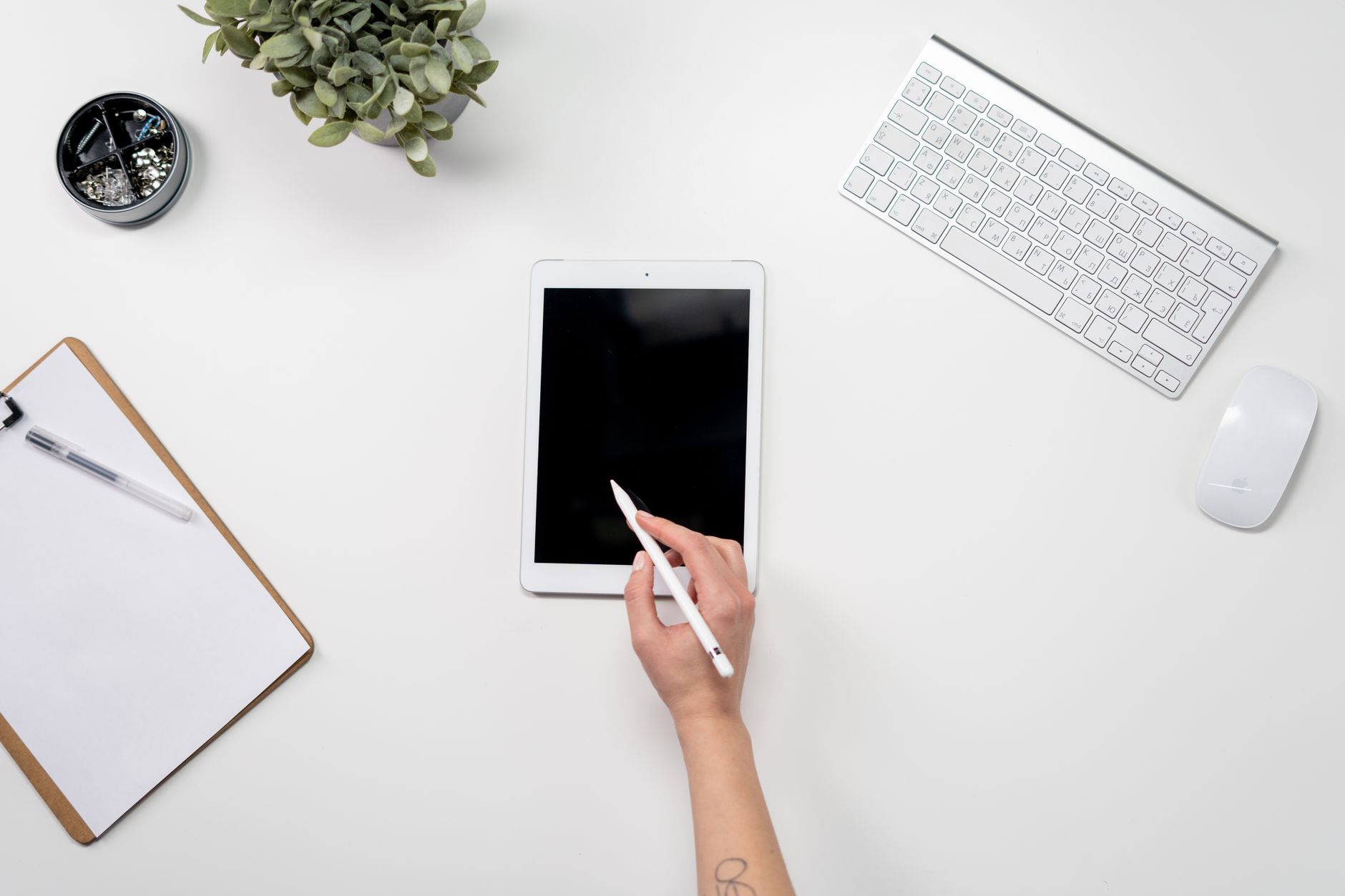 Freelancer organizing multiple client tasks on a tablet using Foco