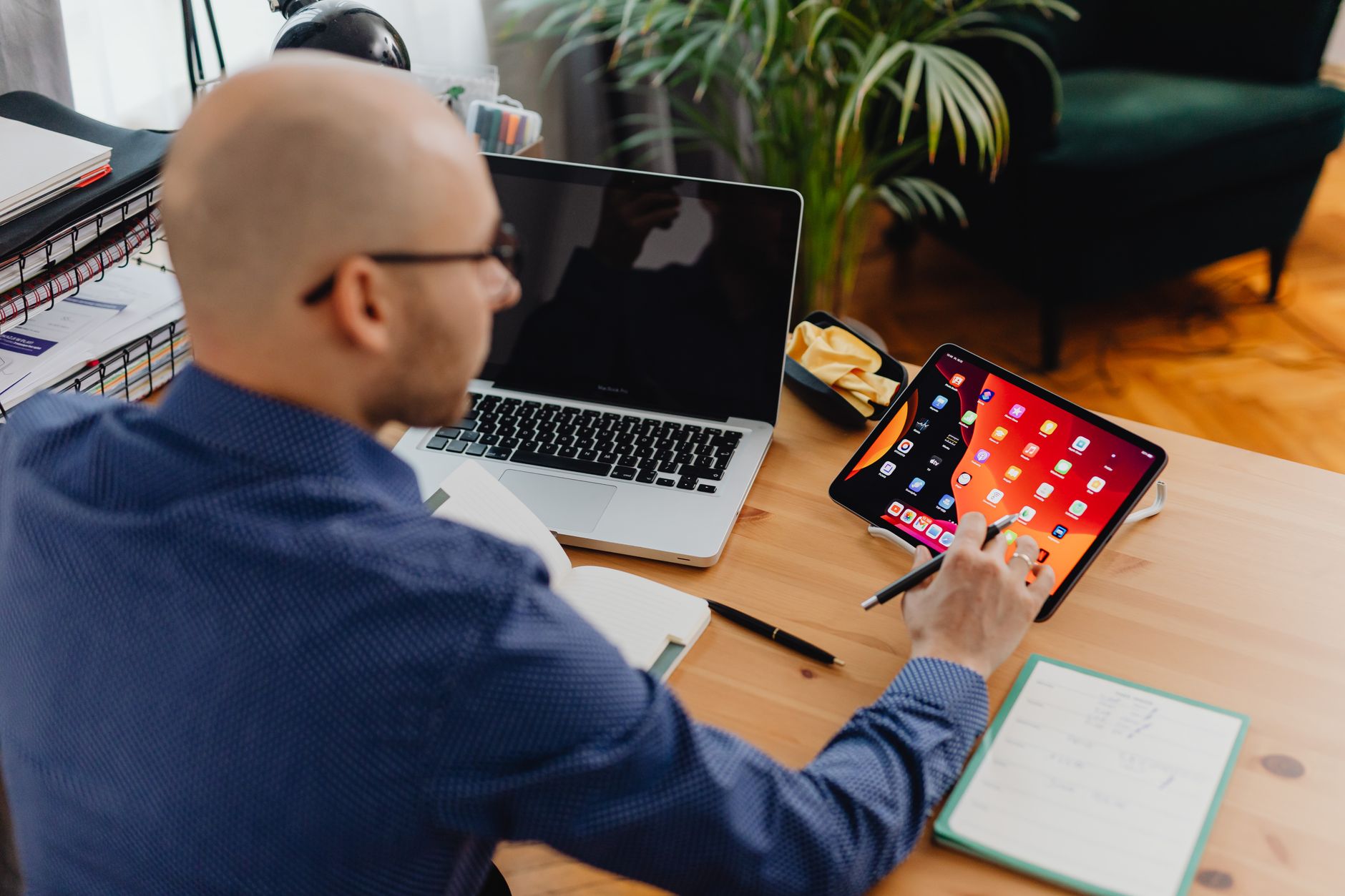 Freelancer organizing tasks from multiple clients on a tablet