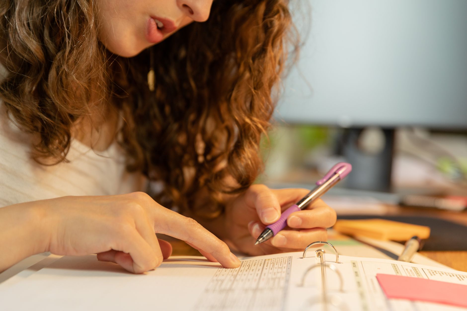 Person reviewing tasks and planning the next day during the evening block