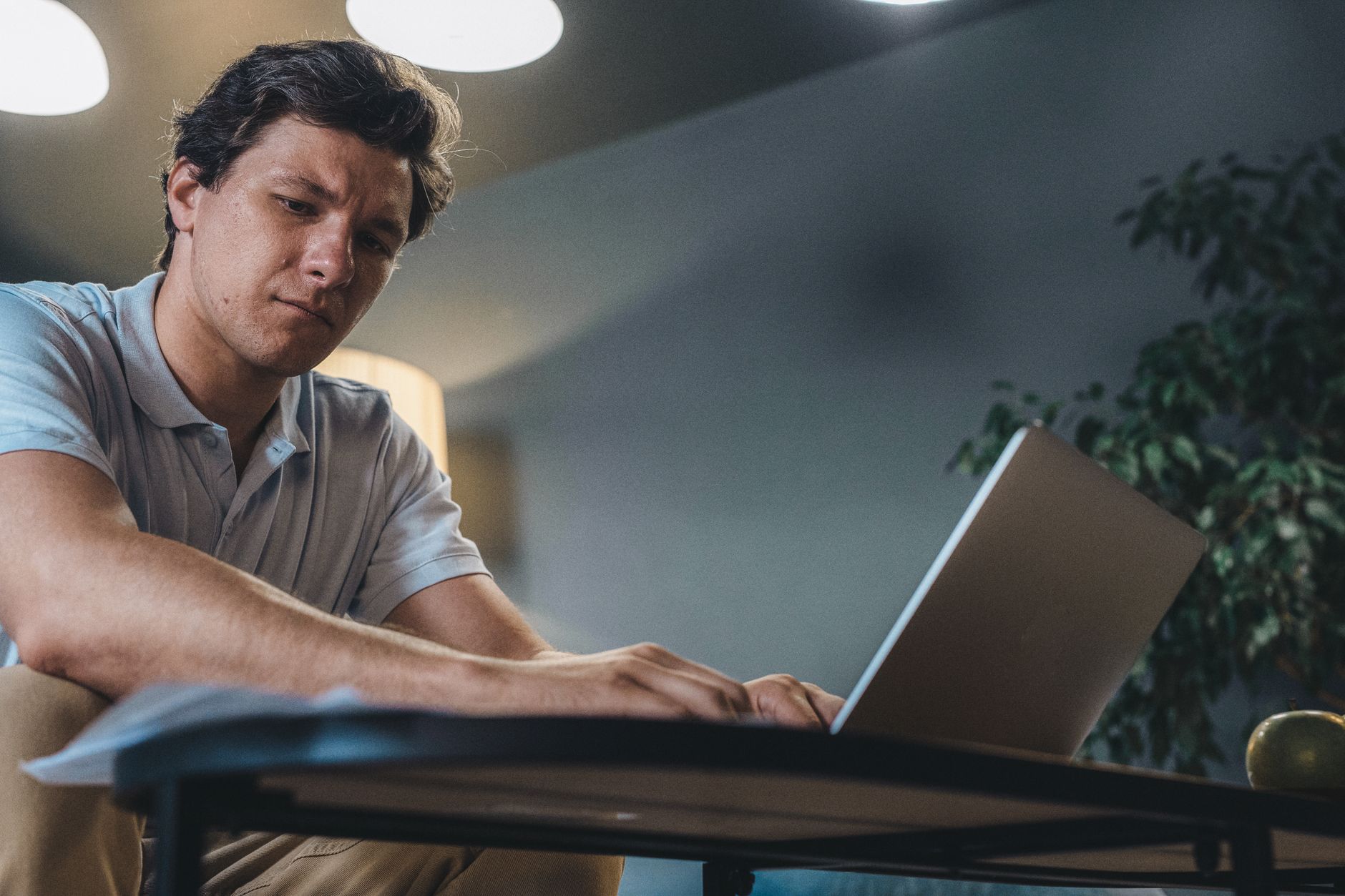 Freelancer organizing tasks from multiple clients on a laptop with color-coded projects