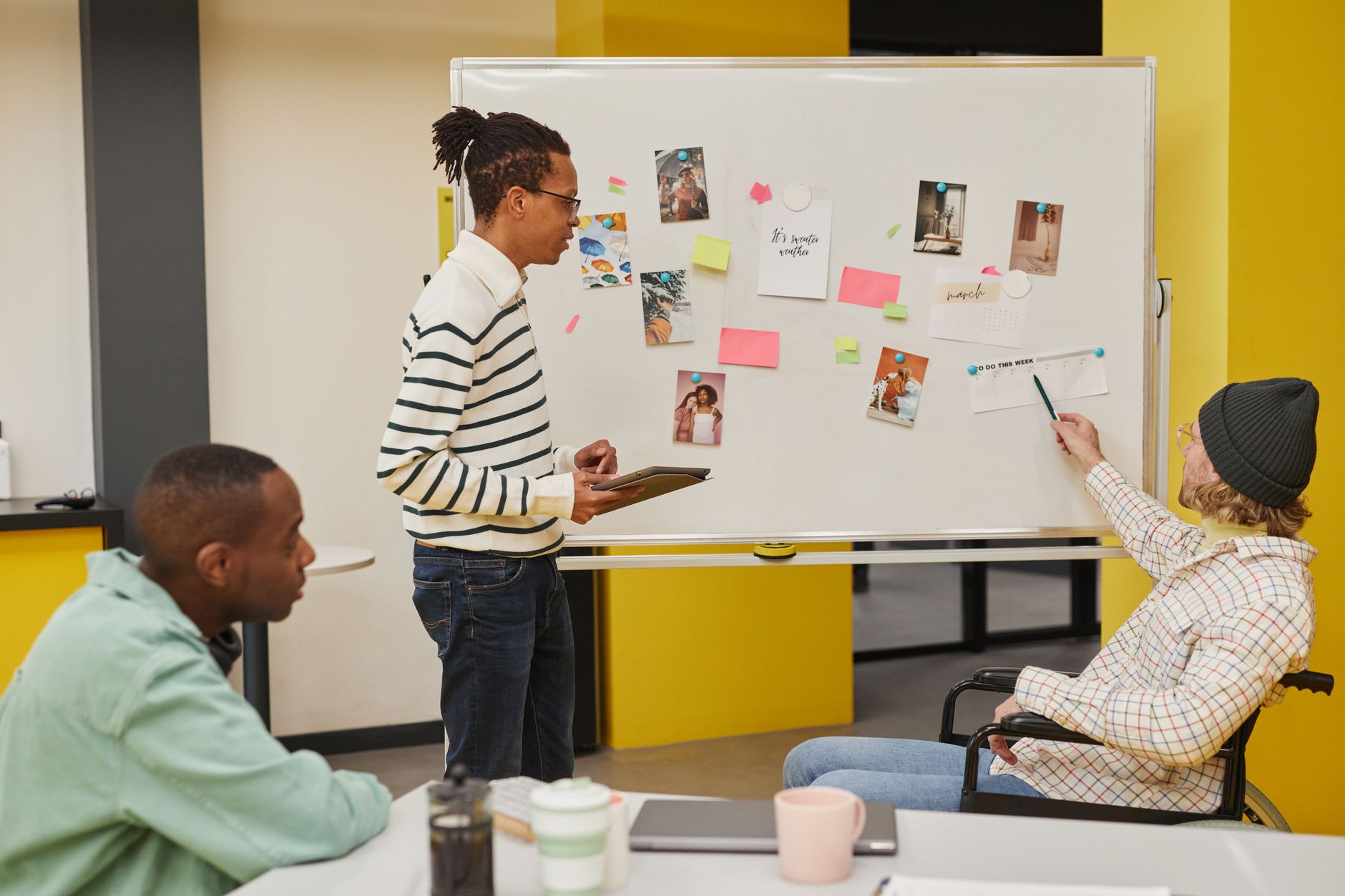 Team Kanban board with tasks grouped by projects and color-coded