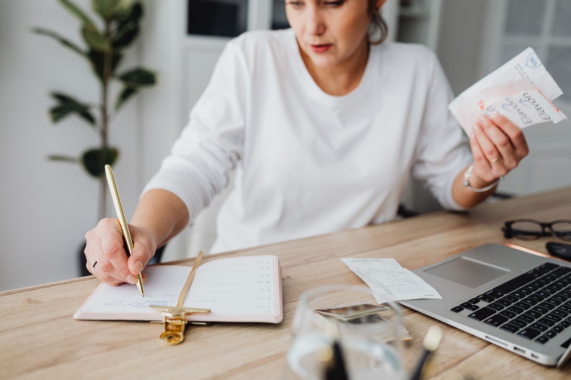 Freelancer planning time blocks on a calendar with tasks from multiple jobs